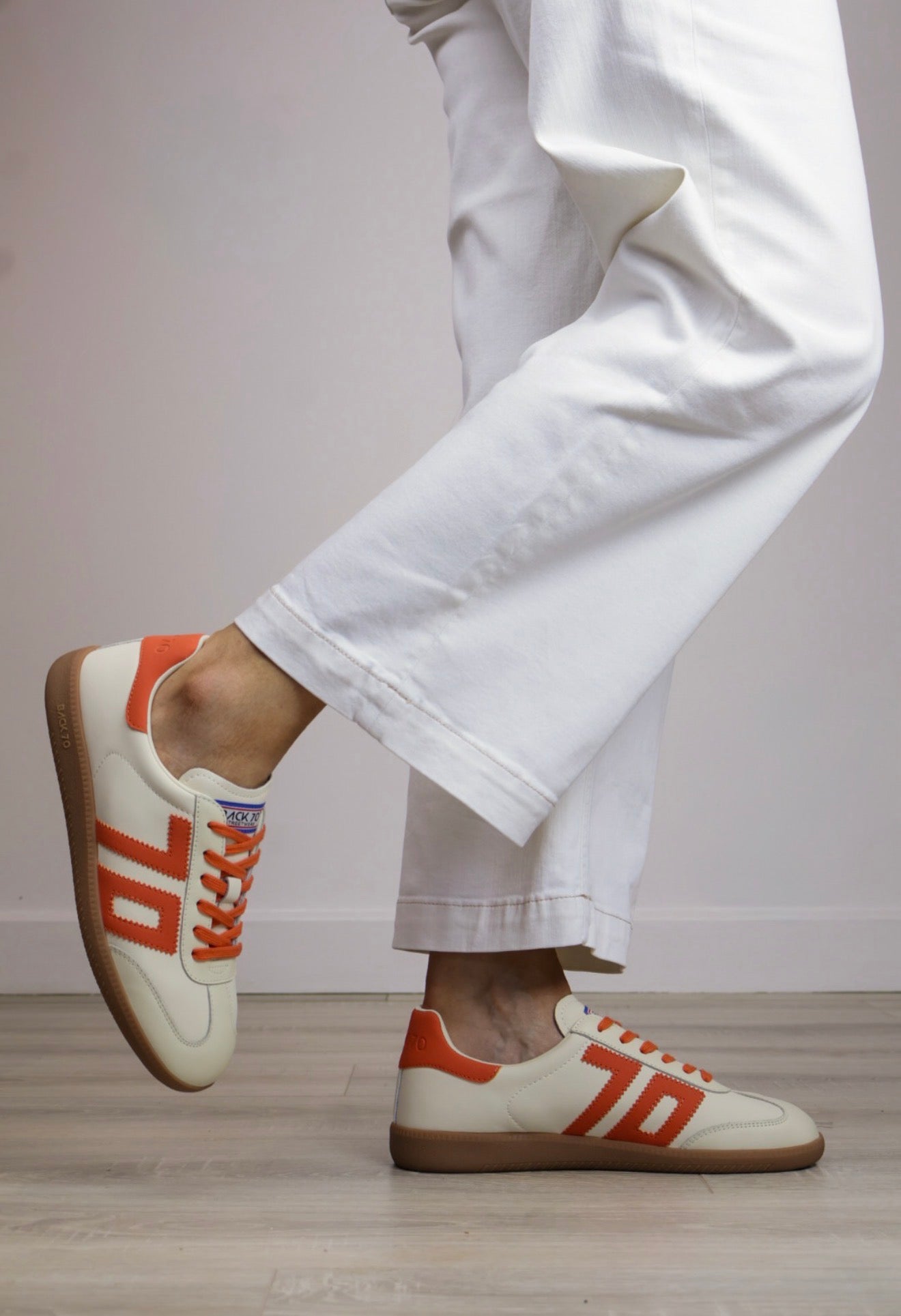 Back 70 - Cloud Cream/Orange Trainer