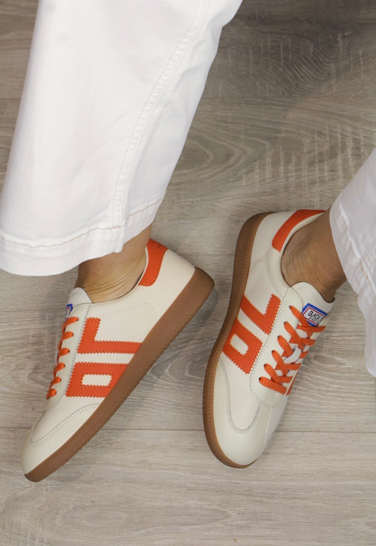 Back 70 - Cloud Cream/Orange Trainer